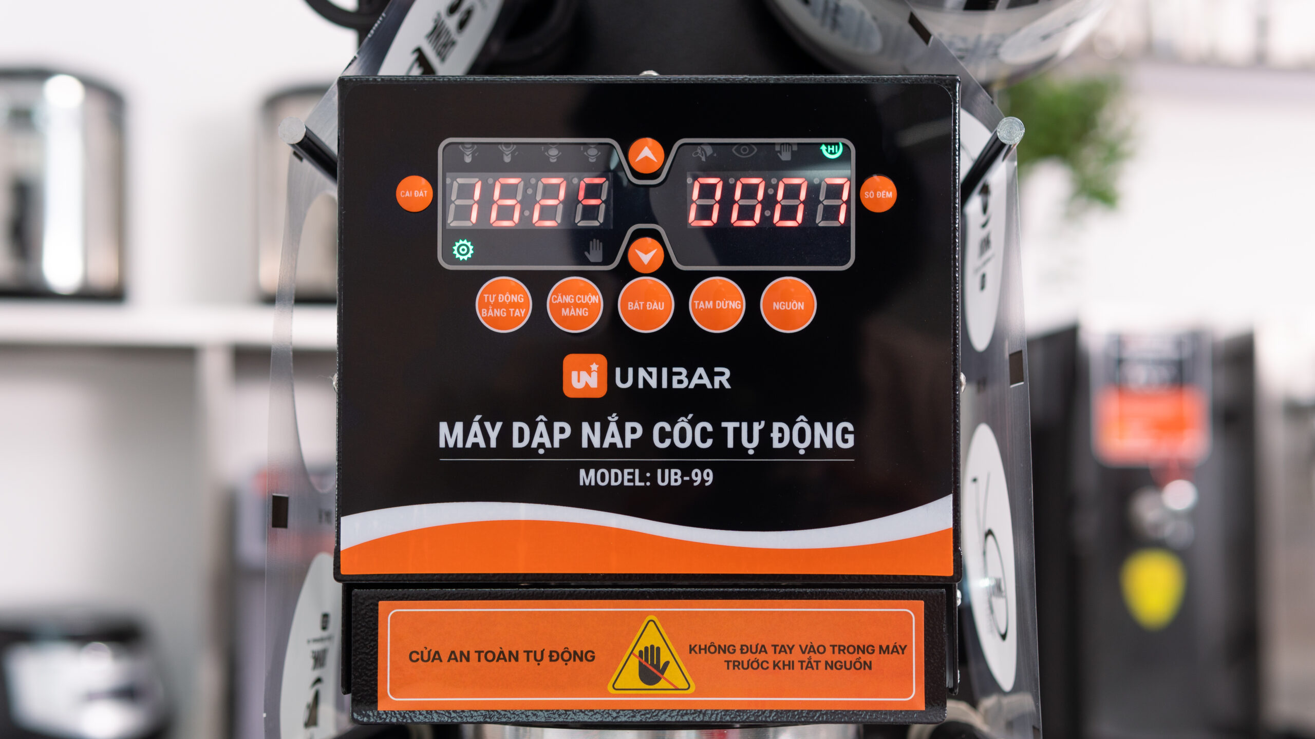 Máy dập nắp cốc tự động Unibar UB-99 Công nghệ Đài loan